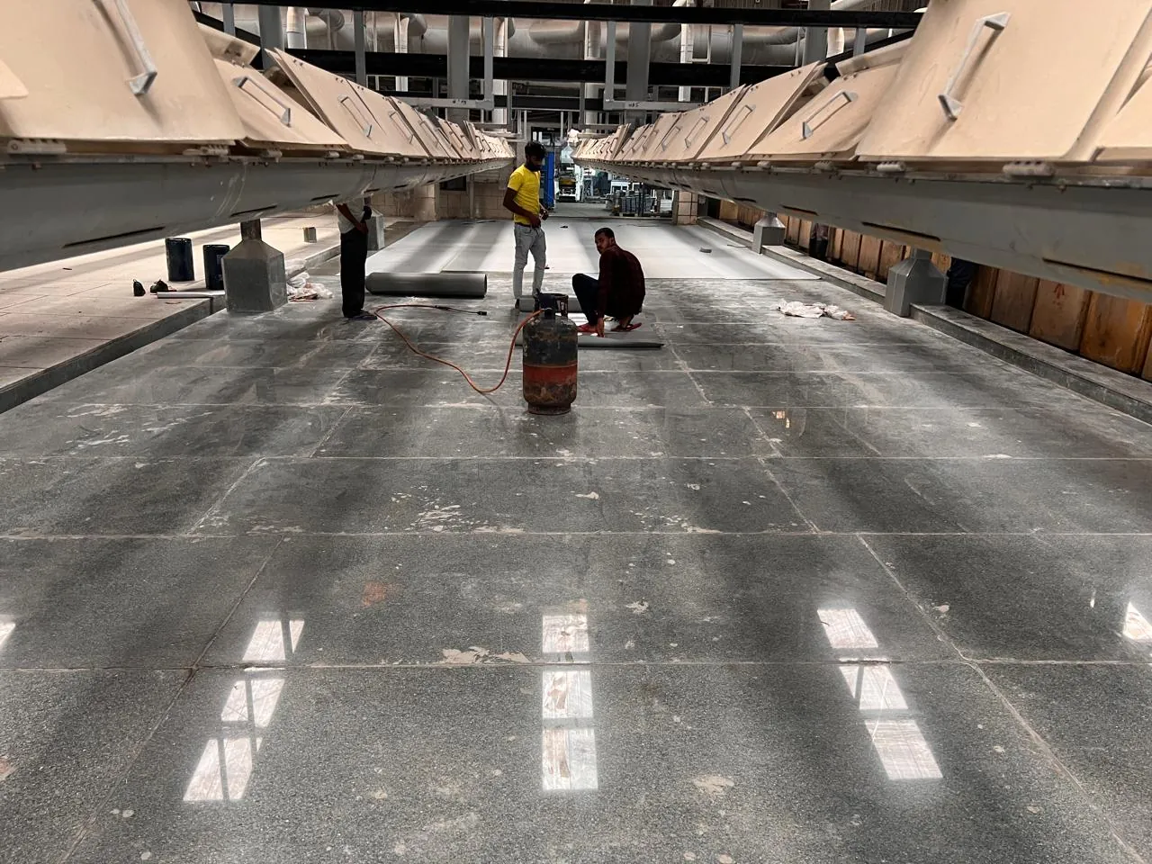 Battery formation area with acid resistant granite flooring at Microtex plant, Bengaluru